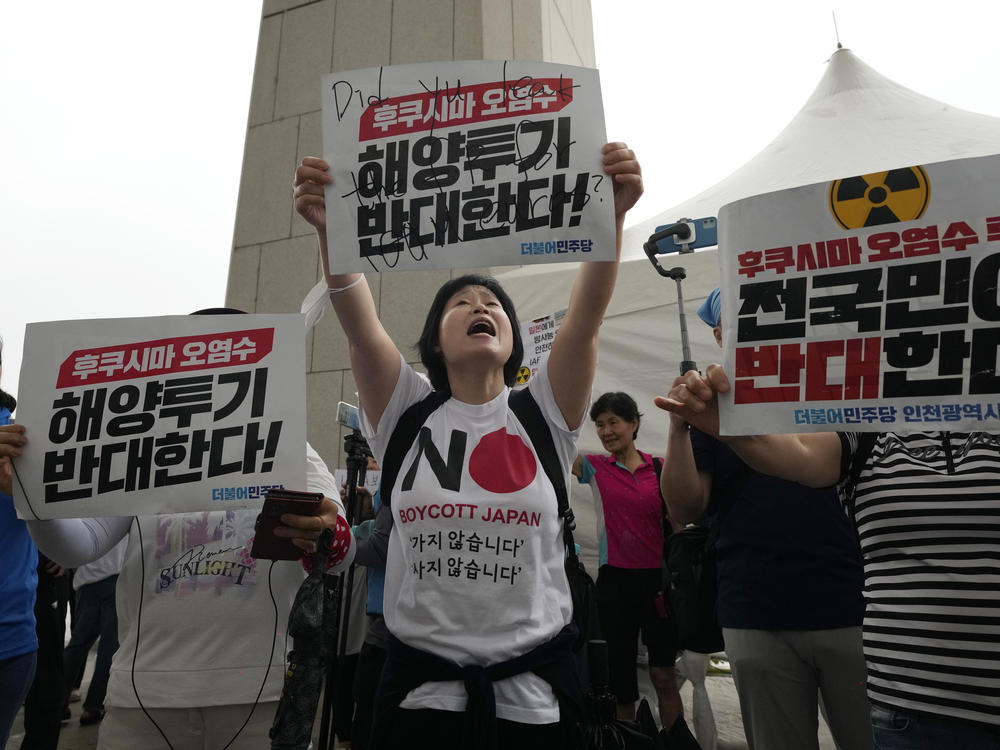 Protesters stage a rally against Japanese government's plan to release treated radioactive water from Fukushima nuclear power plant, at the National Assembly in Seoul, South Korea, on Sunday, July 9, 2023.