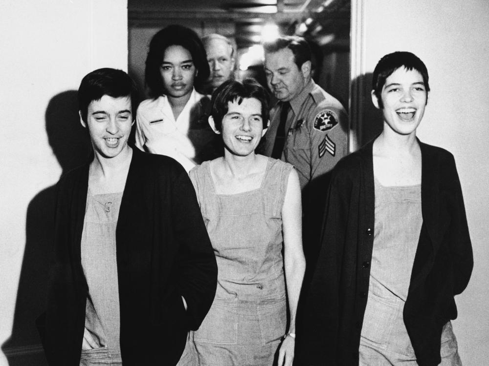 Three of Charles Manson's followers — from left, Susan Atkins, Patricia Krenwinkel and Leslie Van Houten — laughed as they walked to court in Los Angeles for sentencing on March 29, 1971.