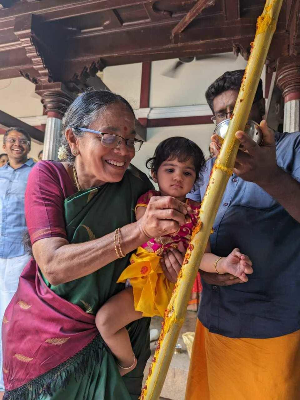 Before the celebration, the youngest members of the family apply turmeric on the bamboo shoot. The ritual is said to ensure a smooth and joyous celebration.