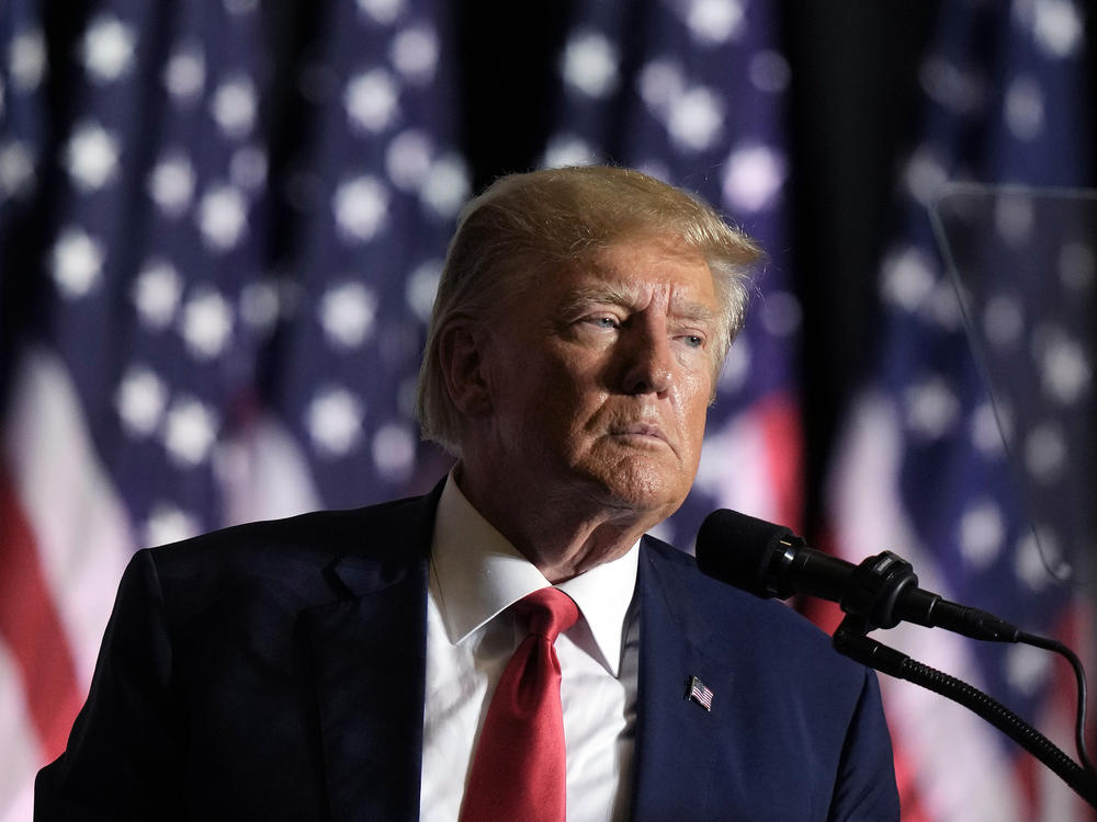 FILE - Former President Donald Trump speaks during a rally, July 7, 2023, in Council Bluffs, Iowa. Trump said Tuesday that he has received a letter informing him that he is a target of the Justice Department's investigation into efforts to undo the results of the 2020 presidential election. Trump made the claim in a post on his Truth Social platform. (AP Photo/Charlie Riedel, File)