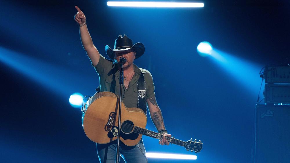 Country music singer Jason Aldean, pictured here performing at the Academy of Country Music Awards in Frisco, Texas in May, is facing a mixed bag of backlash and praise for a new music video that openly alludes to vigilante justice