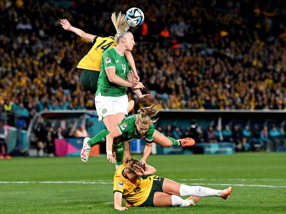 Louise Quinn (#4) of Ireland and Alanna Kennedy (#14) of Australia battle for the ball during the 2023 Women's World Cup on July 20, 2023 in Sydney, Australia. It's Ireland's first appearance at a WWC.