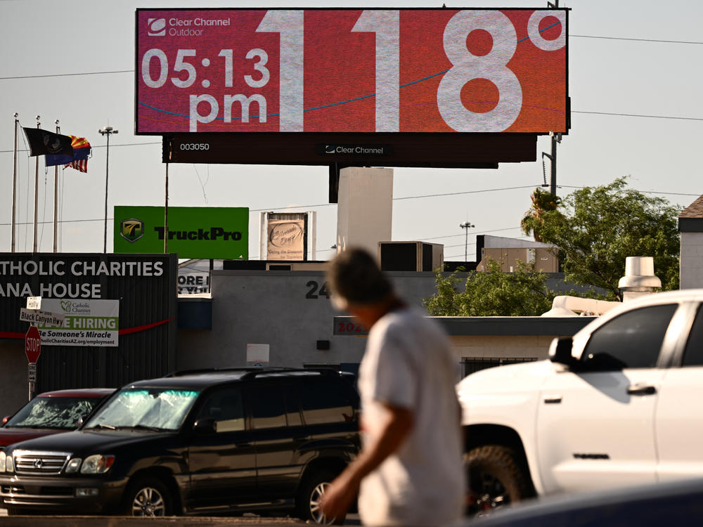 Tens of millions of Americans — including residents in Phoenix, where a billboard displays a temperature of 118 degrees last week — have been living under extreme heat warnings or advisories during the last few weeks. A new study finds climate change is making heat waves more common.