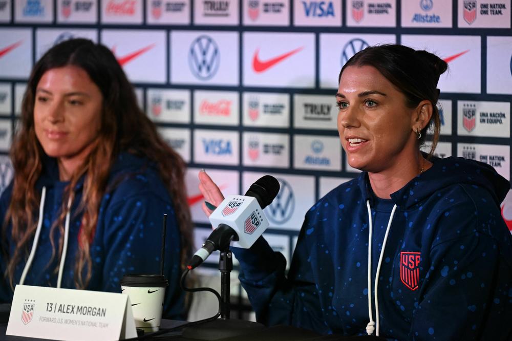 U.S. forward Alex Morgan (right) speaks beside defender Sofia Huerta during a press conference in Auckland, New Zealand on Tuesday, ahead of their World Cup soccer match against the Netherlands.
