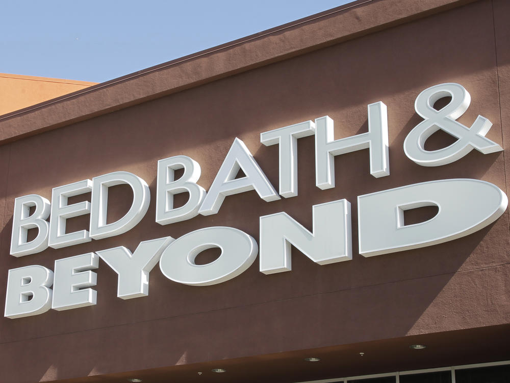 A Bed Bath & Beyond sign is displayed in 2012, in Mountain View, Calif. Overstock.com is dumping its name online and becoming Bed Bath & Beyond.