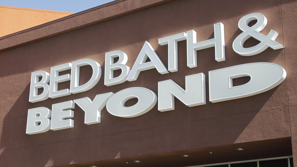 A Bed Bath & Beyond sign is displayed in 2012, in Mountain View, Calif. Overstock.com is dumping its name online and becoming Bed Bath & Beyond.
