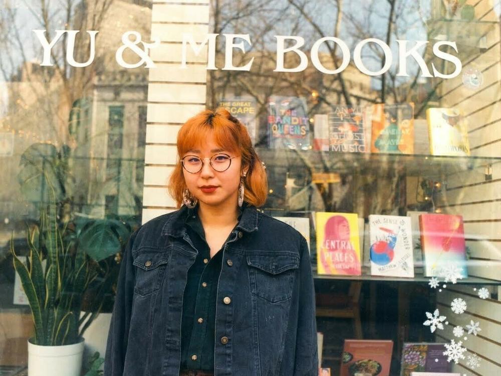 Yu & Me Books was a fairly new business when a fire — which broke out above the store on July 4 — caused substantial damage to the shop. Now, owner Lucy Yu is working to rebuild not just the physical bookstore, but the community around it as well.