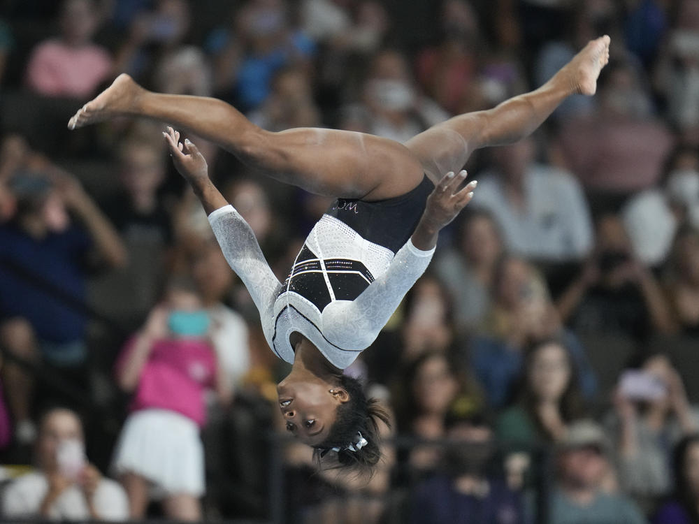 Simone Biles performs on the balance beam at the U.S. Classic gymnastics competition Saturday, Aug. 5, 2023, in Hoffman Estates, Ill.