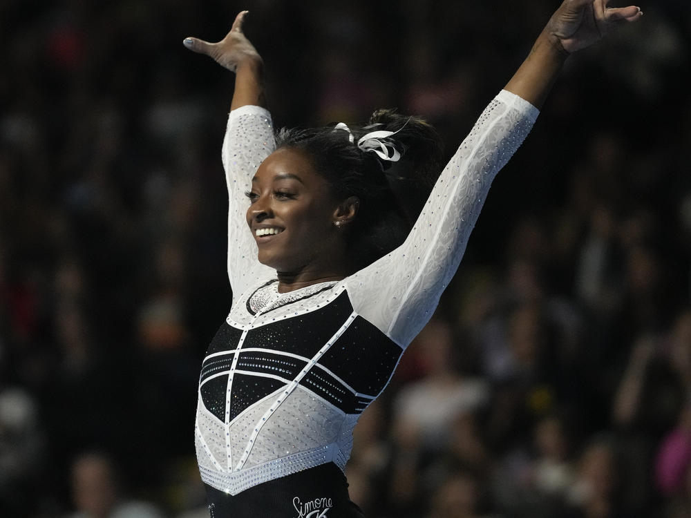 Simone Biles reacts after performing in the floor exercise at the U.S. Classic gymnastics competition Saturday, Aug. 5, 2023, in Hoffman Estates, Ill.