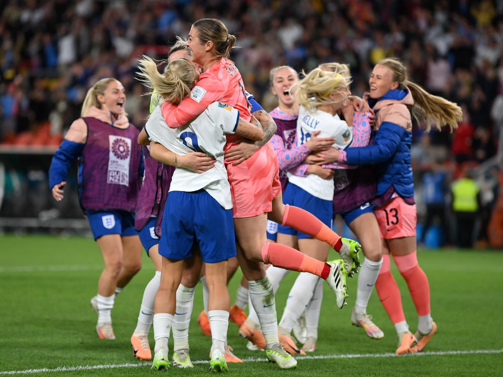 England celebrates the team's victory over Nigeria following a penalty shootout in the round of 16.