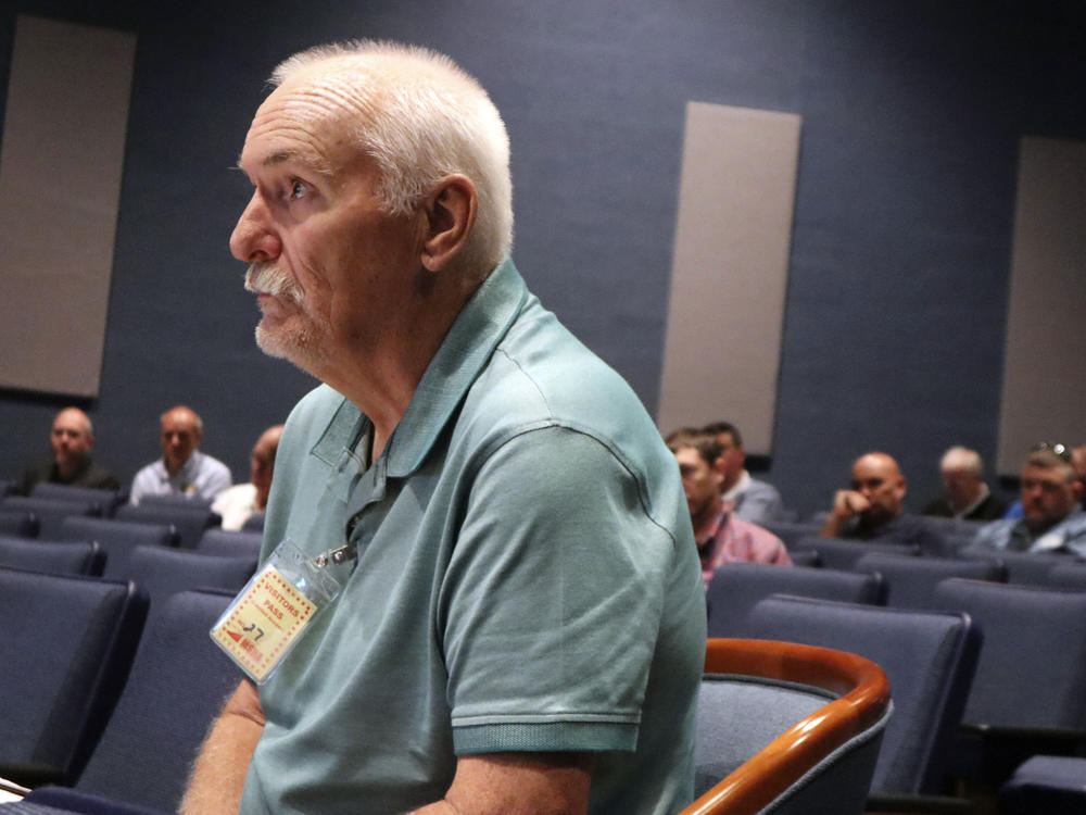 Retired West Virginia coal miner Terry Lilly, who has black lung, speaks during a public hearing hosted by the federal Mine Safety and Health Administration about its draft rule to limit worker exposure on Thursday.