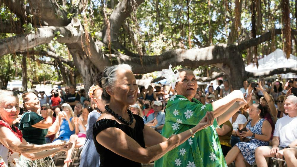 A scene from the 2022 Emma Farden Sharpe Hula Festival, which usually takes place under the famous banyan tree in downtown Lahaina. The organizers pivoted to Facebook for the 2023 edition after the fires badly burned the tree.