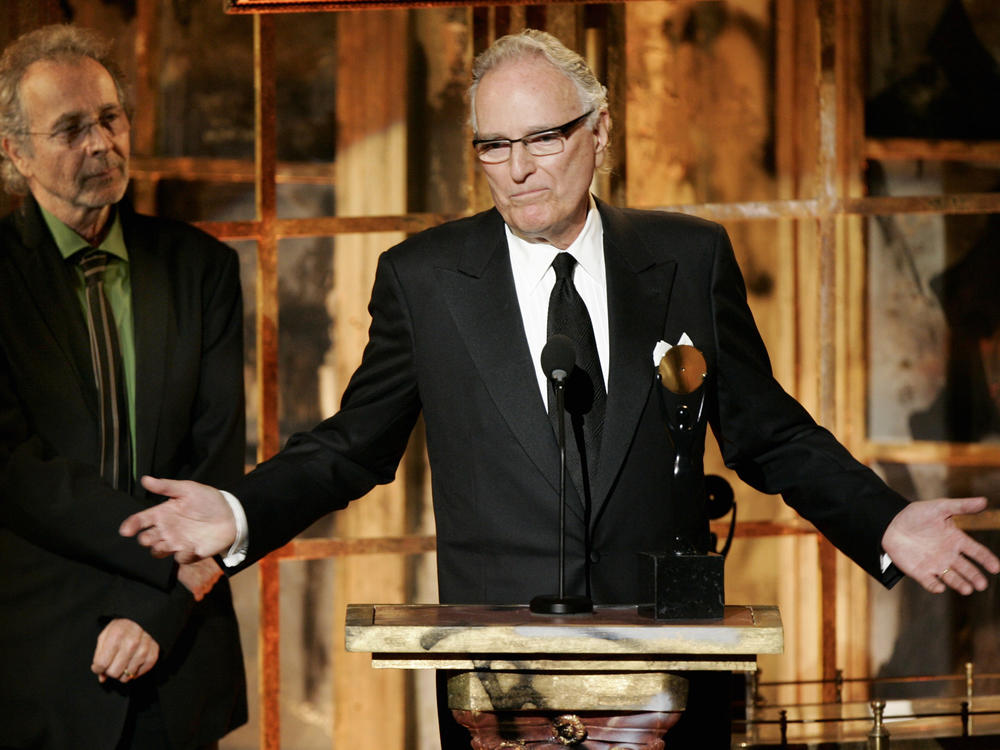 Jerry Moss, right, and Herb Alpert, co-founders of A&M Records, appear during their induction into the Rock & Roll Hall of Fame in New York on March 13, 2006. Moss, a music industry giant who co-founded A&M Records, died Wednesday at his home in Bel Air, Calif. He was 88.
