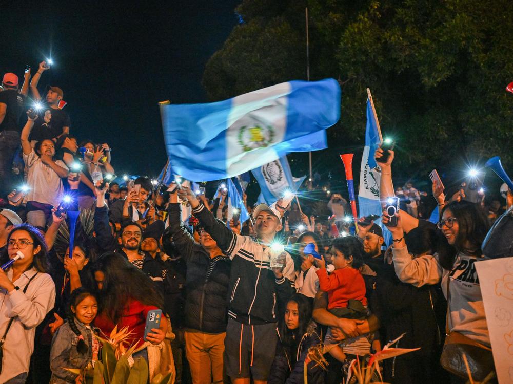 Supporters of Guatemalan presidential candidate for the Semilla party, Bernardo Arevalo, celebrate the results of the presidential run-off election in Guatemala City, on August 20, 2023.