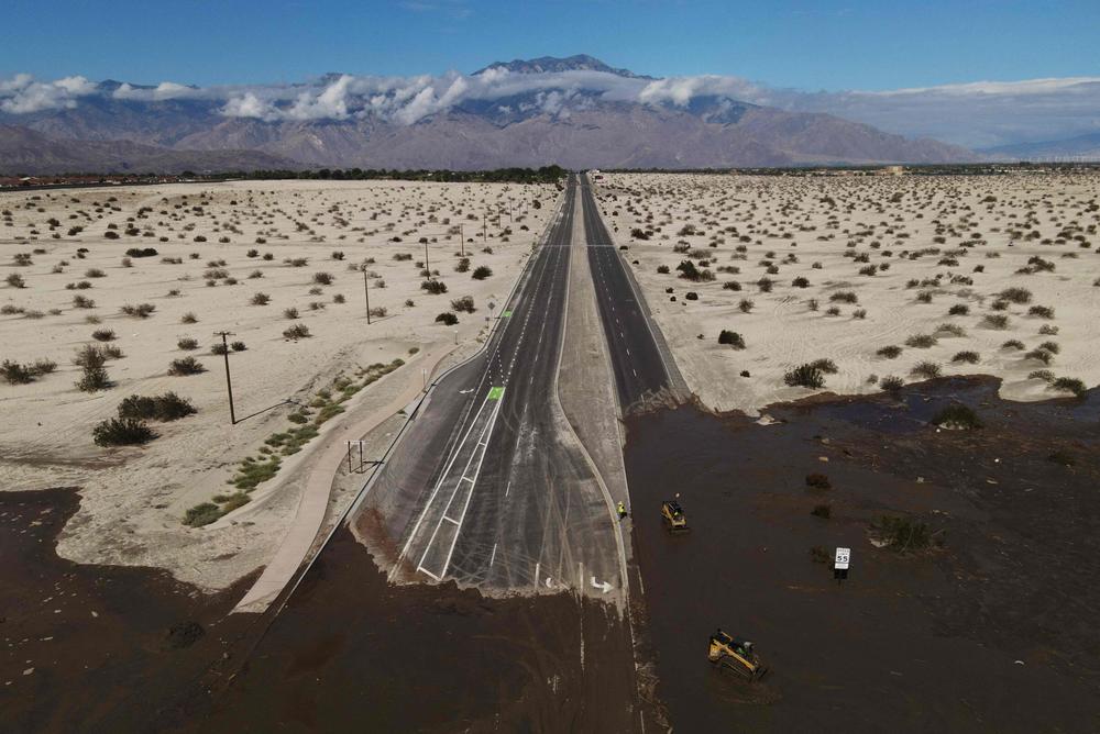 Mon., Aug. 21: An aerial image shows no traffic on Interstate 10 due to flooding and mud crossing the highway following heavy rains from Tropical Storm Hilary, in Rancho Mirage.