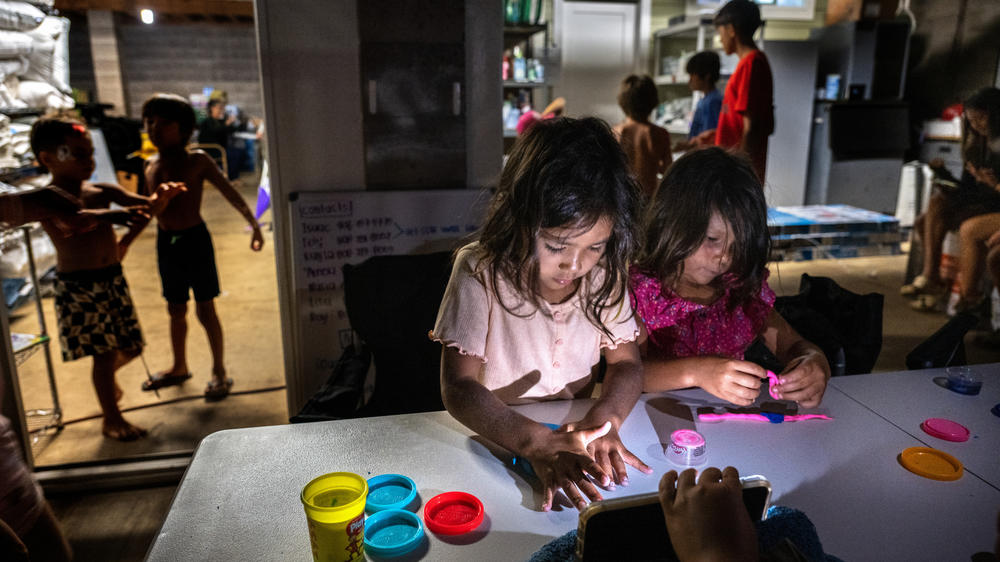 Five-year-old cousins Layla and Mila Cabanilla Okano are among the many children staying with members of their extended family at one property on Maui in the wake of the wildfires.