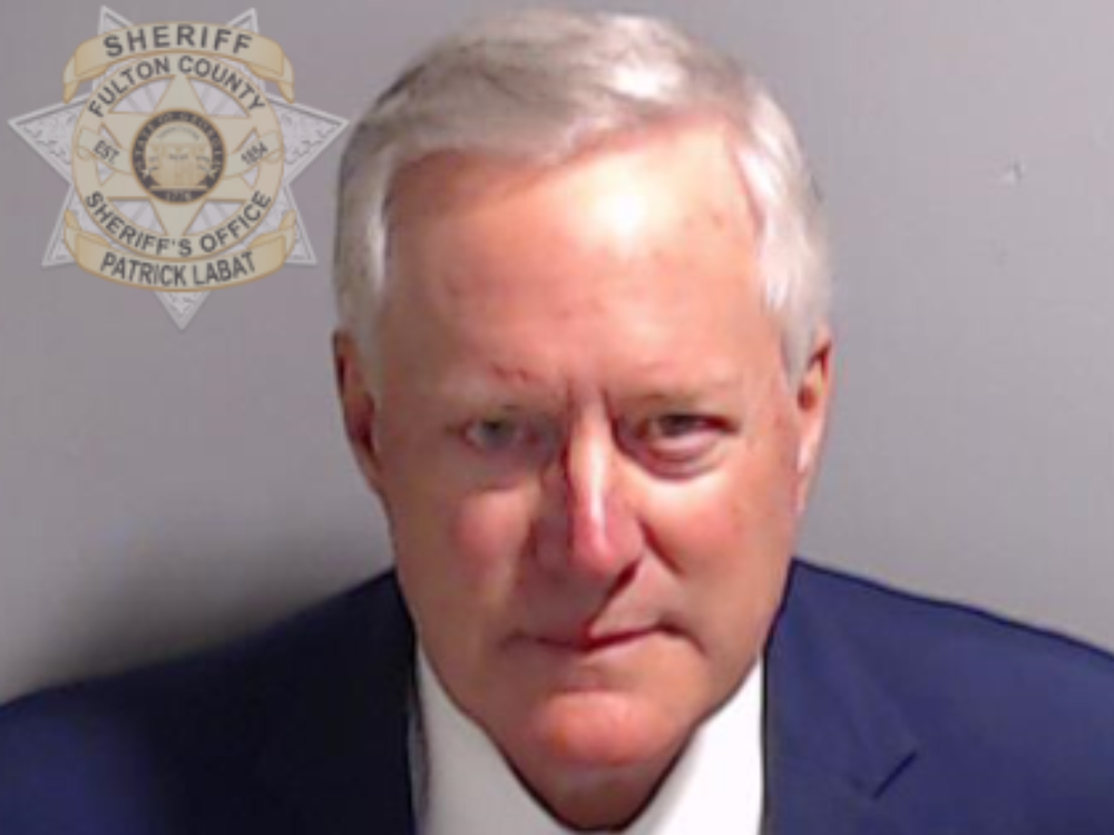 This booking photo provided by the Fulton County Sheriff's Office shows Mark Meadows in Atlanta Thursday, after he surrendered and was booked.