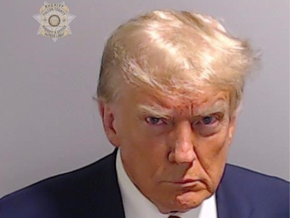 Former President Donald Trump's booking photo was released after he was booked in Atlanta.