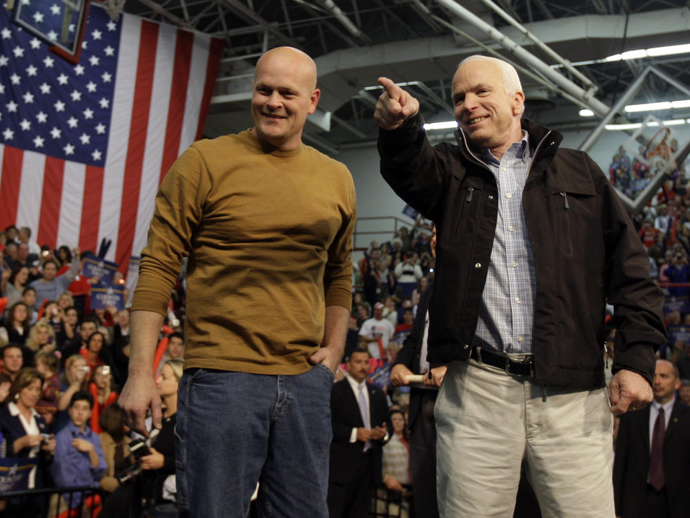 Republican presidential candidate, U.S. Sen. John McCain, R-Ariz., right, stands with Joe Wurzelbacher, also known as 