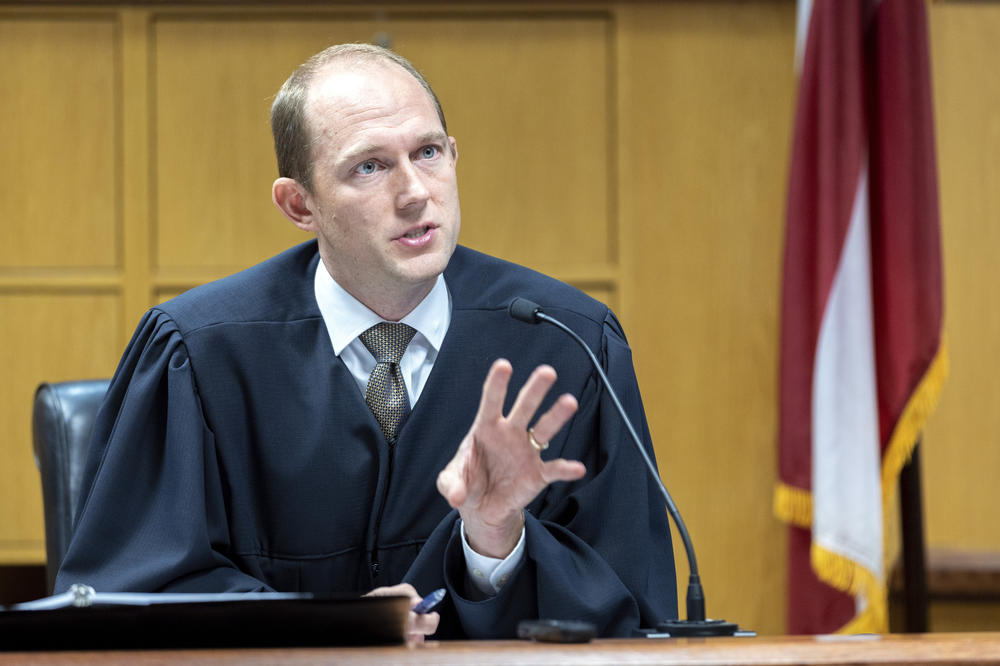 Fulton County Superior Court Judge Scott McAfee presides over a hearing Thursday regarding media access in the case against former President Donald Trump and 18 others.