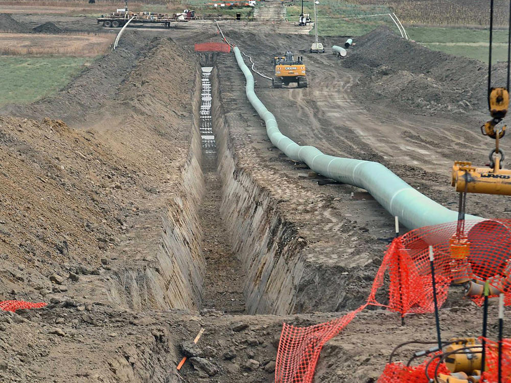 Construction continues on the Dakota Access Pipeline in 2016. Federal officials on Friday released a draft environmental review of oil pipeline without a recommendation from five options for the future of the line's controversial river crossing in North Dakota.