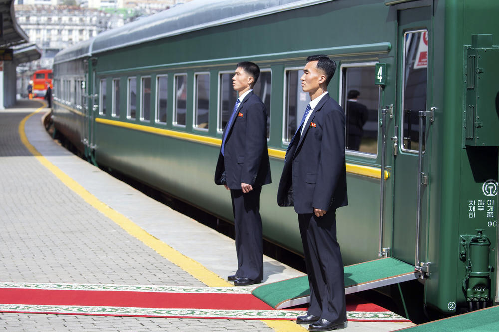 In this photo released by press office of the administration of Primorsky Krai region, North Korea's security officers wait for North Korean leader Kim Jong Un near the train as he leaves Russia, at the main train station in Vladivostok, Russia, on April 26, 2019.