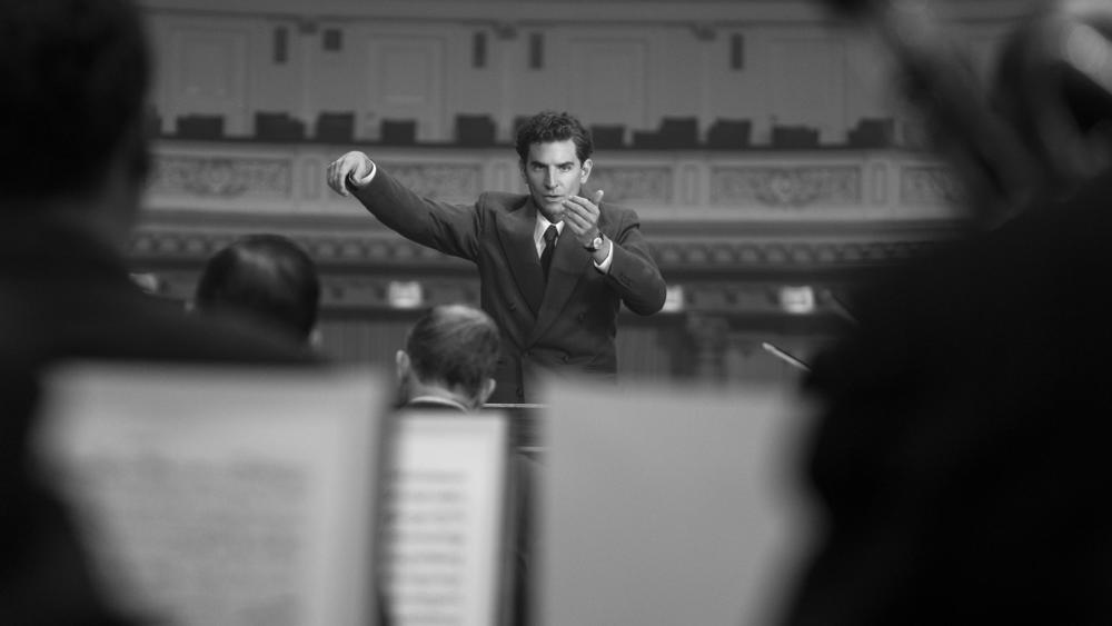 Bradley Cooper as Leonard Bernstein in <em>Maestro</em>.