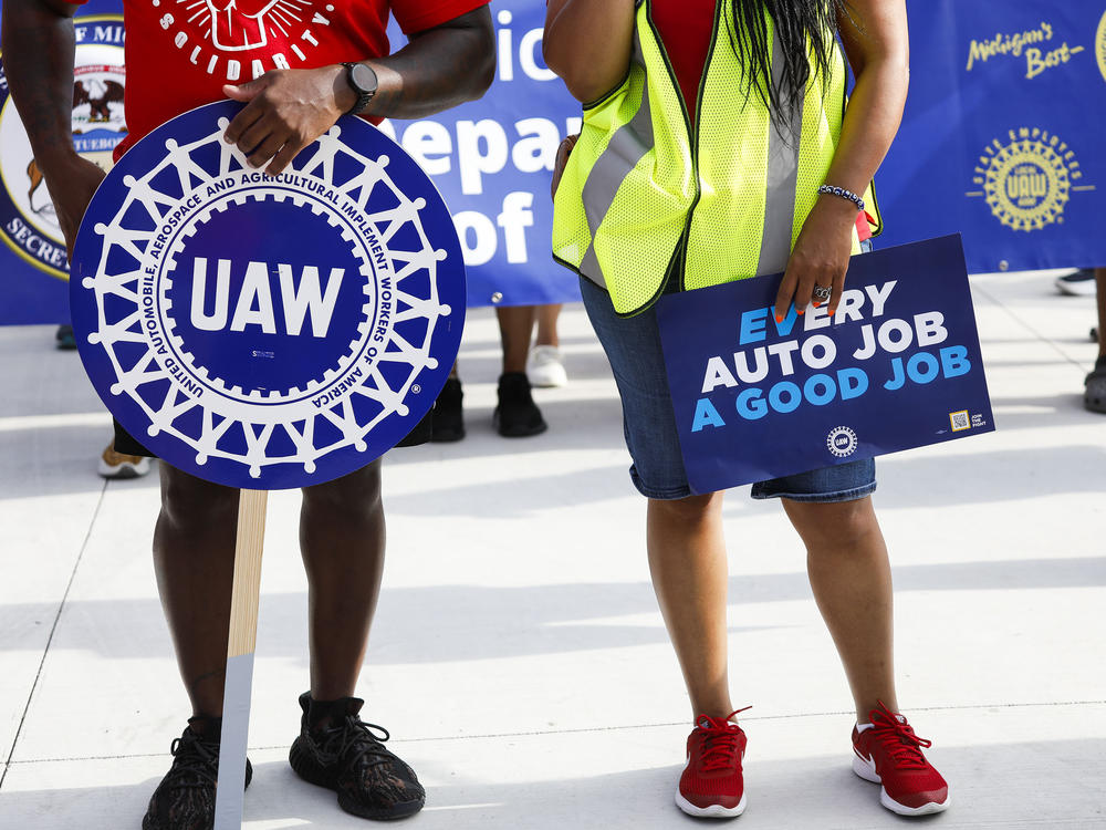 United Auto Workers members and others gather for a rally after marching in the Detroit Labor Day Parade in Detroit on Sept. 4, 2023. Only hours remain before UAW contracts with the Big 3 automakers expire just before midnight.