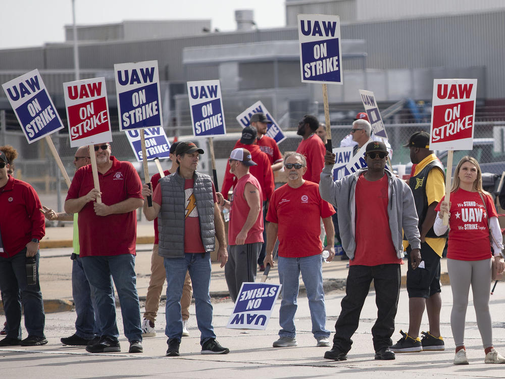 United Auto Workers members strike at the Ford Michigan Assembly Plant on September 16, 2023 in Wayne, Michigan. This is the first time in history that the UAW is striking all three of the Big Three auto makers, Ford, General Motors, and Stellantis, at the same time.