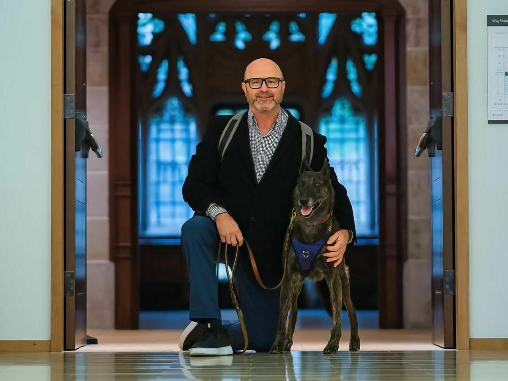 James Hatch was a dog handler in the military. At Yale, he's often accompanied in class by his service dog, Mina.
