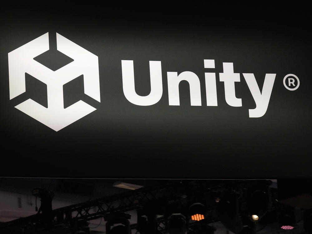 A Unity sign is displayed at the company's booth at the Game Developers Conference 2023 in San Francisco.