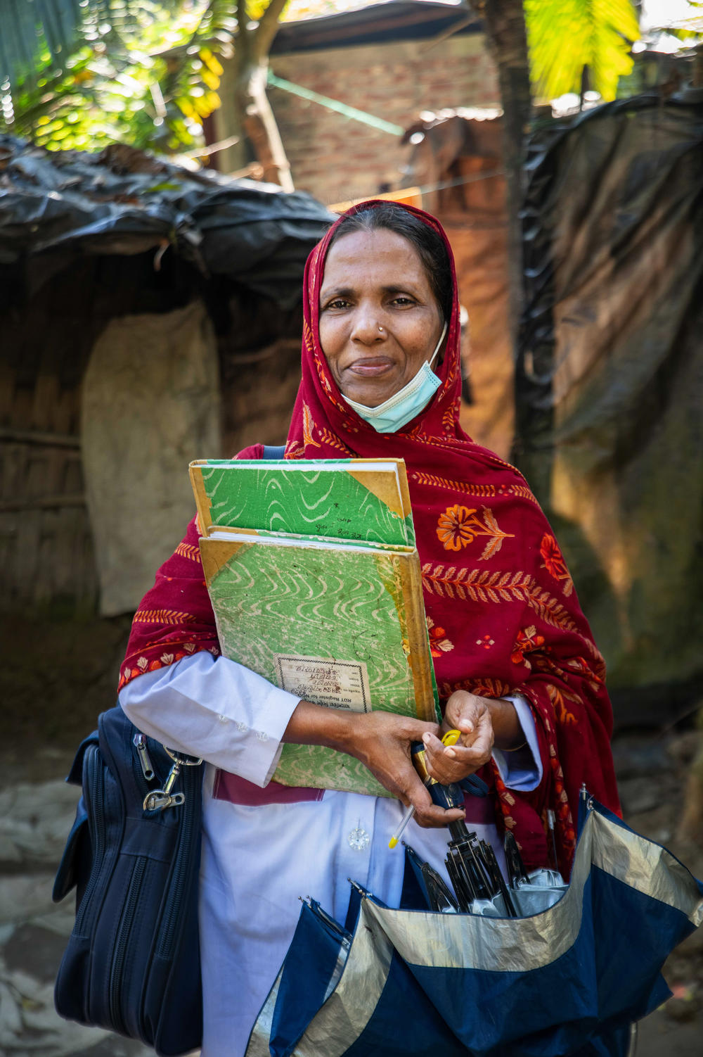 Bulbul Aktar, a health worker, will make daily calls to a patient with malaria to see how they're doing.