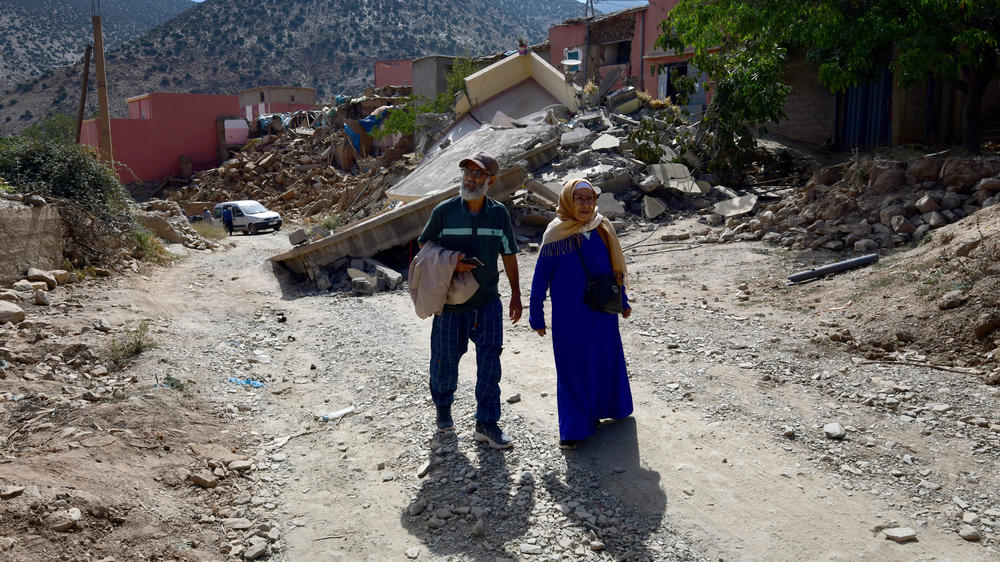 Brother and sister Boujemaa and Aicha Ounasser return home to their birthplace in the Atlas Mountains on Sept. 12 to view the rubble of the devastating earthquake in Tnirte, Morocco.