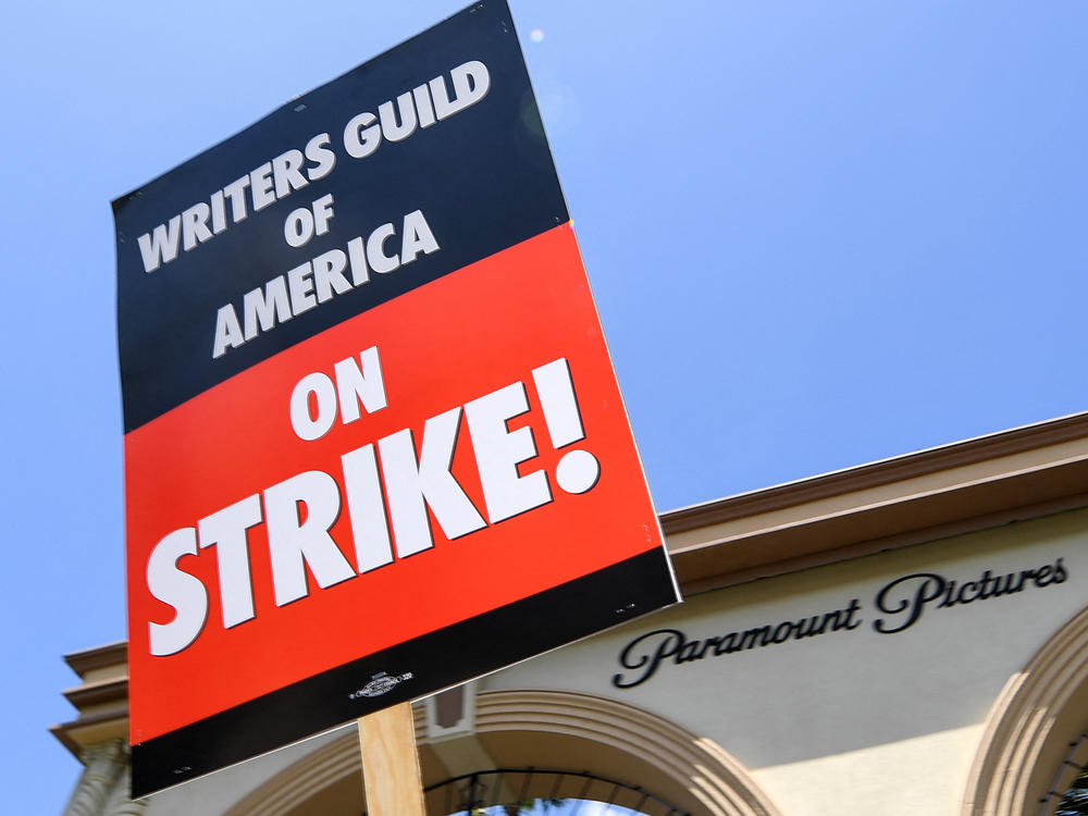 Screenwriters on strike protest in front of Paramount Studios on May 2, 2023 in Los Angeles, California.