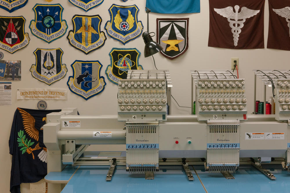 An embroidery machine at the Defense Logistics Agency Troop Support Flag Room.