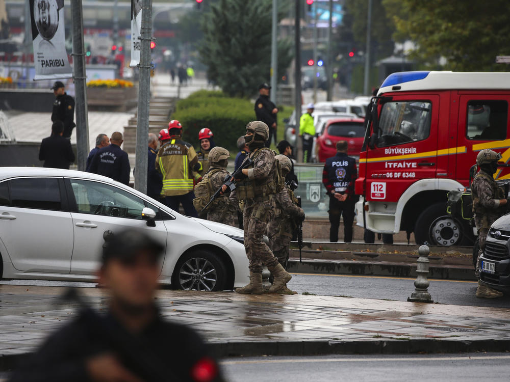Turkish security forces cordon off an area after an explosion in Ankara on Sunday. A suicide bomber detonated an explosive device in the heart of the Turkish capital, hours before parliament was scheduled to reopen after a summer recess. A second assailant was killed in a shootout with police.