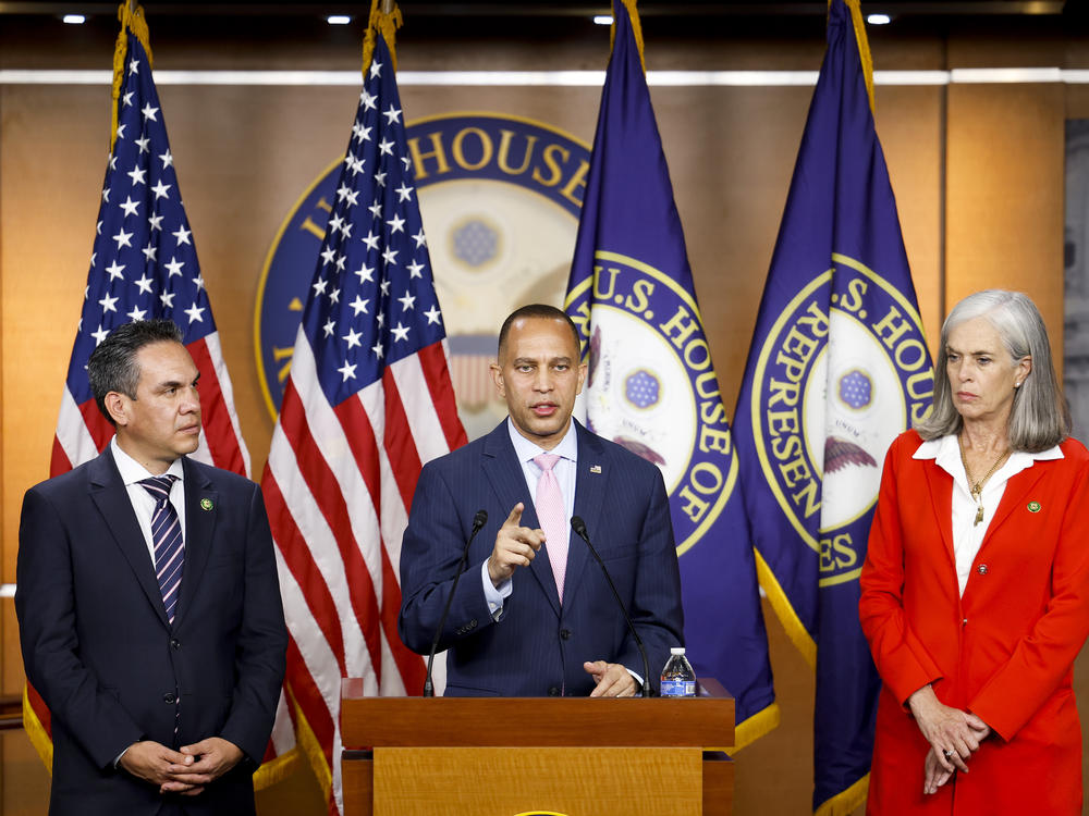 House Minority Leader Hakeem Jeffries, D-N.Y., speaks at a news conference after the House passed a short-term funding bill on Saturday, joined by House Minority Whip Katherine Clark, D-Mass., and Rep. Pete Aguilar, D-Calif., chair of the House Democratic Caucus.