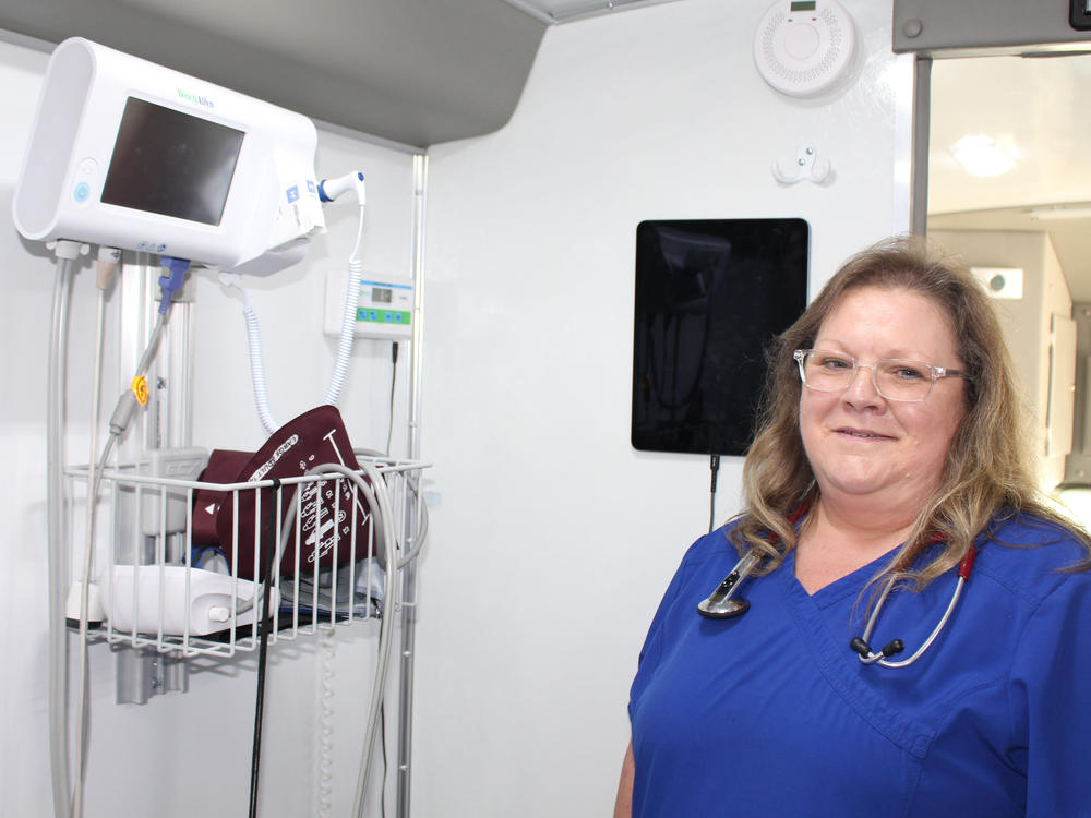 Inside the DocGo mobile clinic, registered nurse Kimberly French works 10-hour shifts. She says the operation needs to gain the trust of the community.