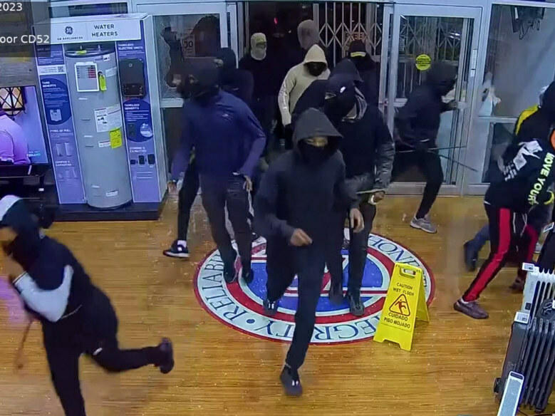 An image from security camera footage shows alleged thieves breaking into a P.C. Richard & Son appliance store in Philadelphia in late September.