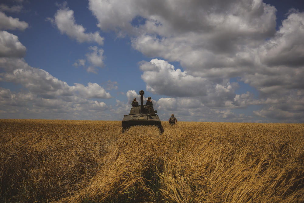 Ukrainian soldiers patrol with a howitzer near the frontline on July 01, 2023. Artillery fire is believed to be a major reason farmers are abandoning their fields.