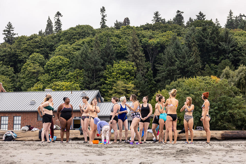 Rain or shine, the cold plunge crew gathers just ahead of 8 a.m. on Sunday mornings in front of the bathhouse at Seattle's Golden Gardens Park. Entering the water is a communal activity, how long you stay is up to you.