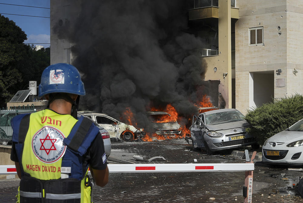 Sat., Oct. 7: Cars burn after a rocket fired from the Gaza Strip hit a parking lot and a residential building in Ashkelon, southern Israel.