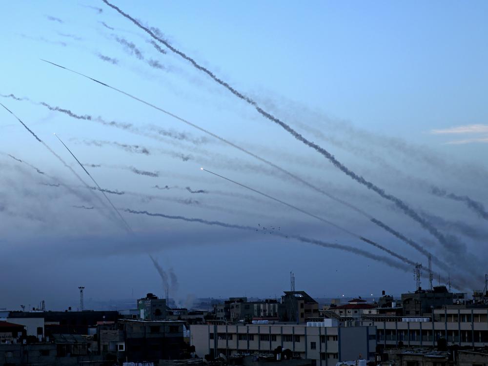Rockets are fired from Gaza City toward Israel on Oct. 7, 2023.