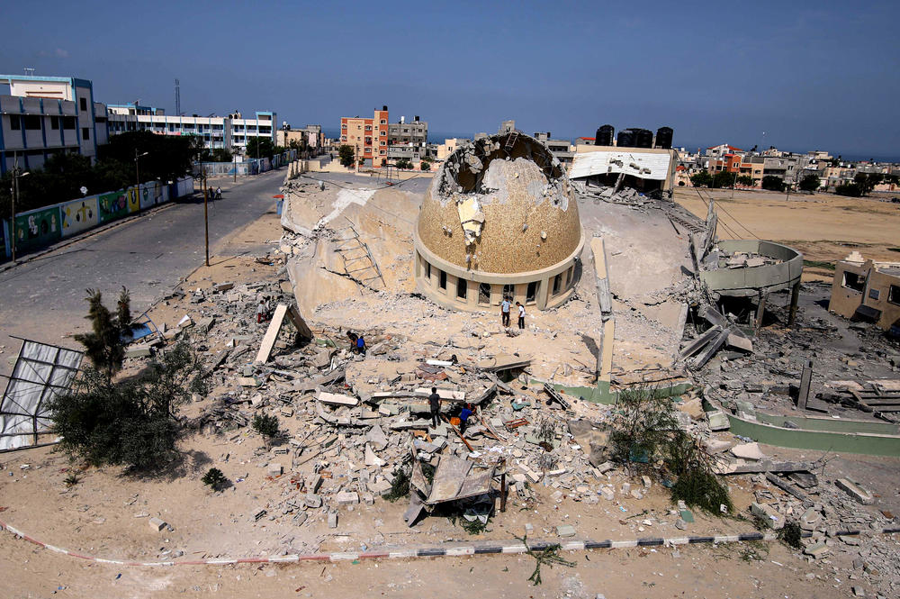 Sun. Oct. 8: A destroyed mosque following an Israeli airstrike in Khan Younis, Gaza Strip.