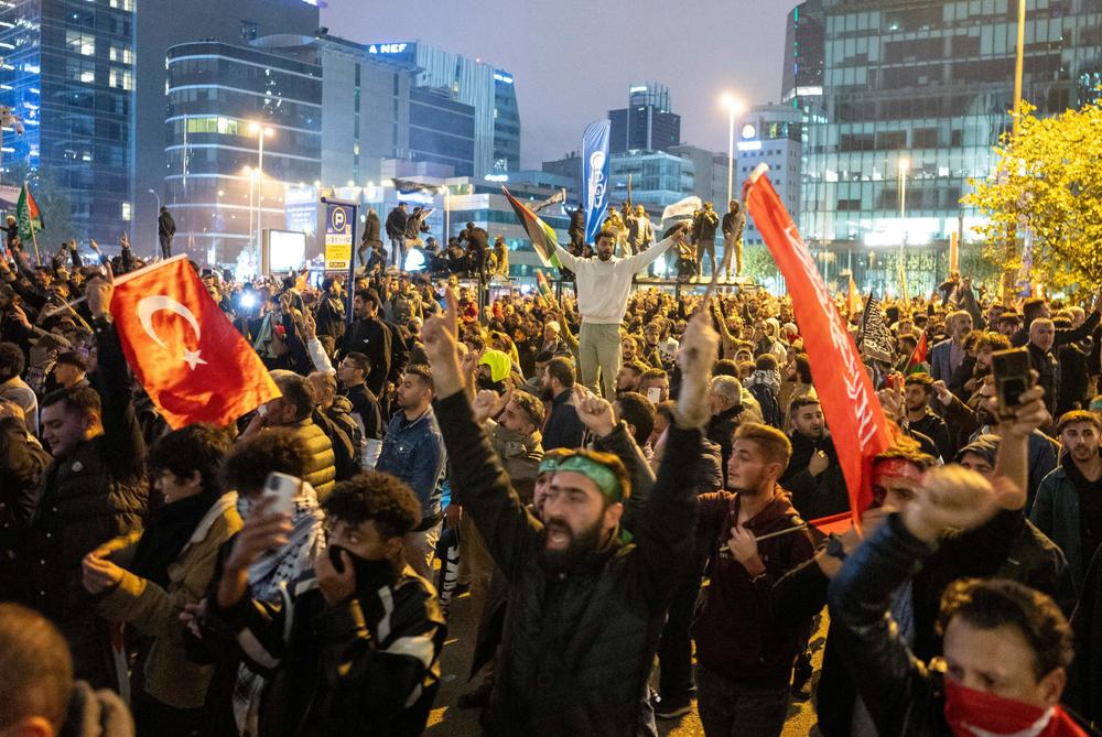 Weds., Oct. 18: People take part in a protest outside the Israeli Consulate to show solidarity with Palestinians, in Istanbul.