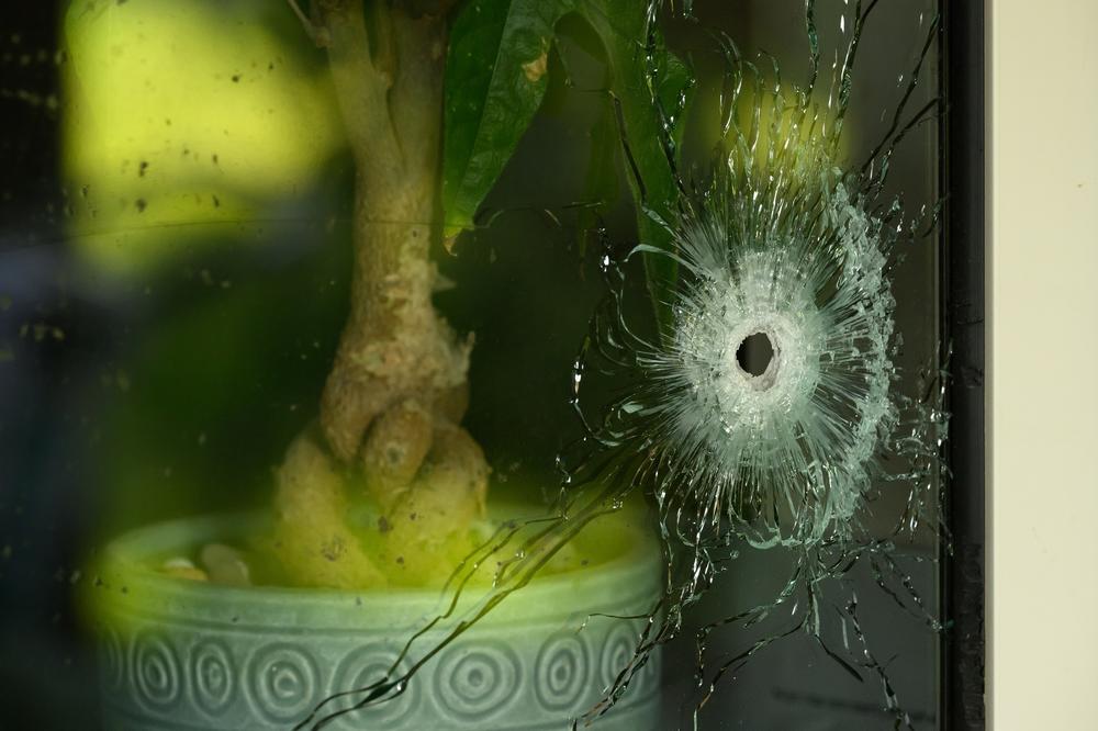A bullet hole is seen in a window at one of the homes invaded during the attack by Hamas on October 7.