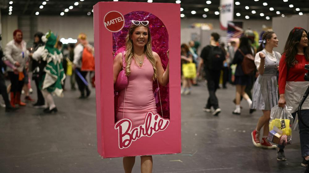 A cosplayer dressed as a boxed Barbie doll attends the MCM Comic Con at ExCeL exhibition centre in London on May 26.