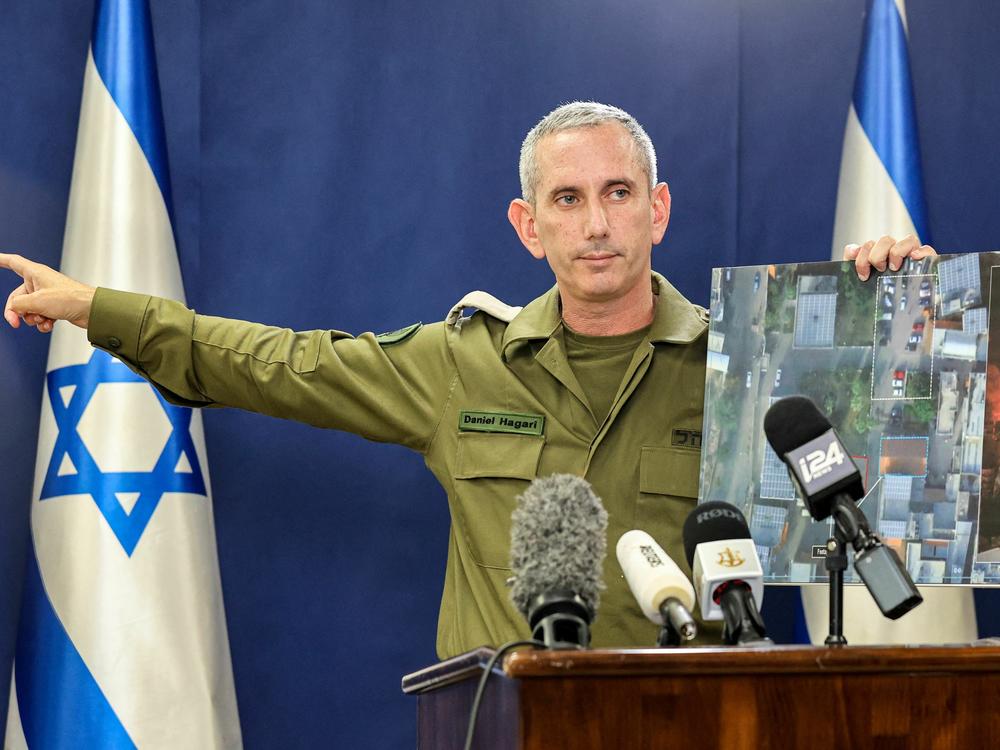Israeli army spokesman Rear Admiral Daniel Hagari speaks to the press from The Kirya, which houses the Israeli Ministry of Defence, in Tel Aviv on Wednesday, Oct. 18.