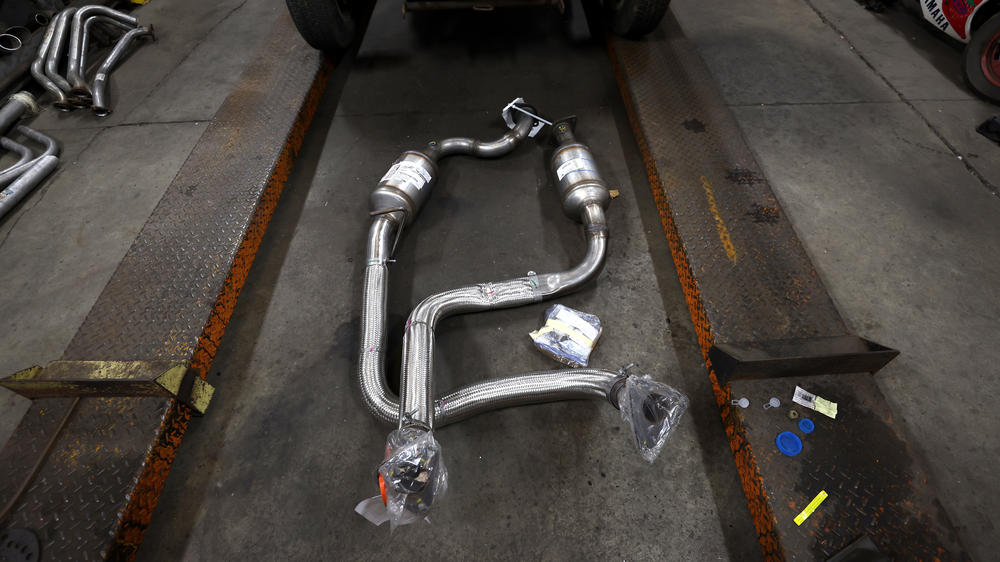 A brand new catalytic converter sits on the floor at Johnny Franklin's Muffler in San Rafael, Calif. No state has seen more catalytic converter thefts than California, according to State Farm.