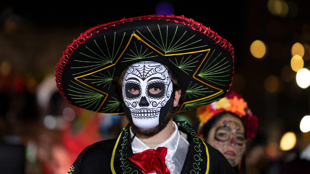 A Halloween reveler participates in New York City's 48th annual Greenwich Village Halloween Parade, Sunday, Oct. 31, 2021, in New York.